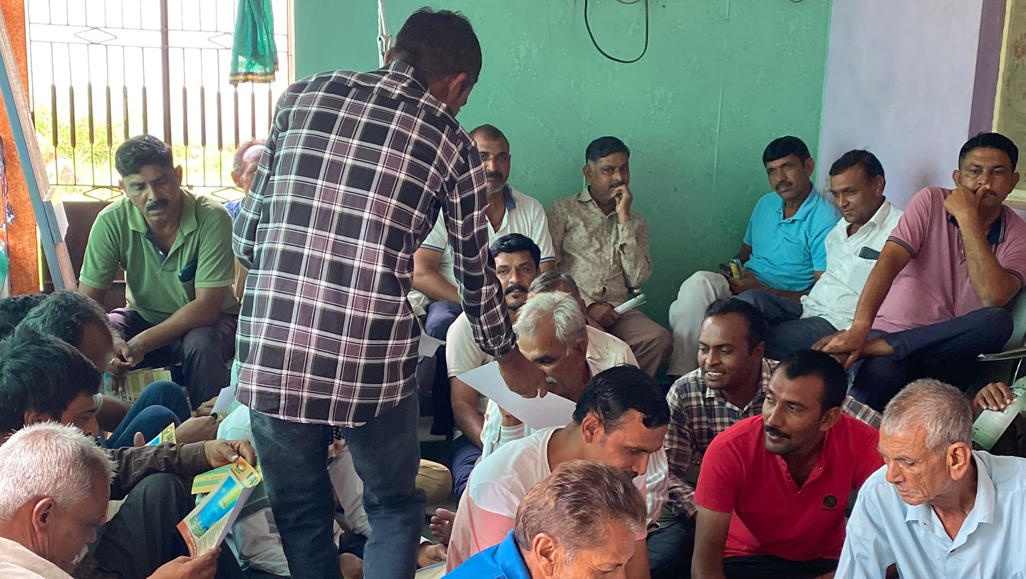 On-ground community meeting conducted by India Action Project