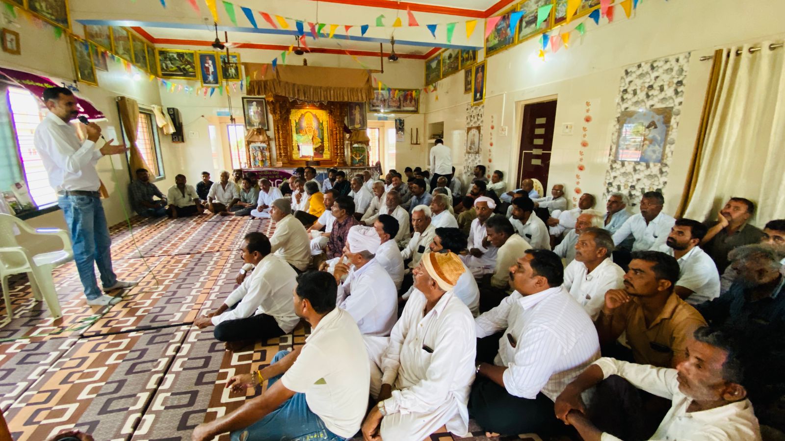 On-ground community meeting conducted by India Action Project